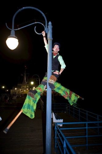 Eros Climbs Light Pole